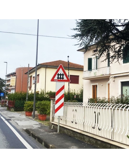 Level Crossing Road Sign with Triangle Barriers
